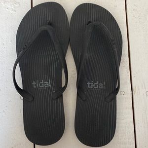 Tidal black flip flops